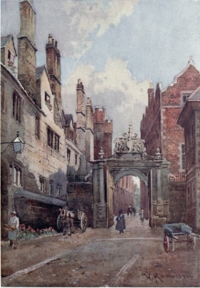 NEVILE’S GATE, TRINITY COLLEGE

To the left are the College kitchens and on the right is Bishop’s
Hostel. The buildings on the left are among the most ancient in this
college. Through the picturesque old gateway we see up the lane into
Trinity Street.