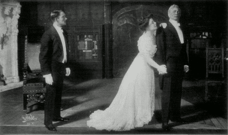 [Photo, from the play,
of Jefferson and Shirley appealing to Mr. Ryder]