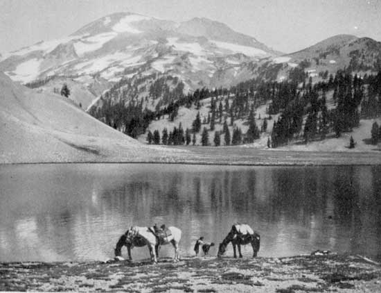 A trailside dip in a mountain lake