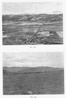 Fig. 121—Looking north from the hill near Anta in the
Anta basin north of Cuzco. Typical composition of slopes and intermont
basins in the Central Andes. Alluvial fill in the foreground; mature
slopes in the background; in the extreme background the snow-capped
crests of the Cordillera Vilcapampa.