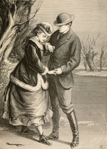 man and woman ice skating