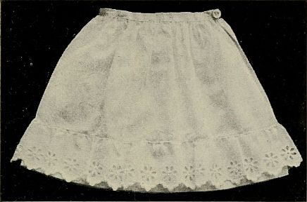 looks like skirt with eyelet ruffle