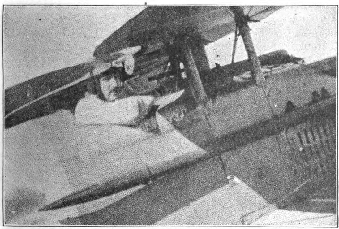 Fig. 2-a. Machine Gun Mounting on S. P. A. D. Biplane. Gun Is Rigidly Attached to Fuselage Top in Front of Pilot.