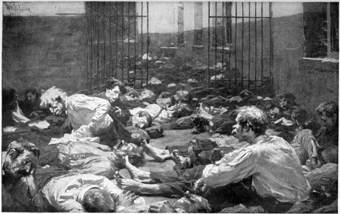Men, without jackets or shoes, sprawled all over the floor with
little open space. The bars of a jail can be seen.