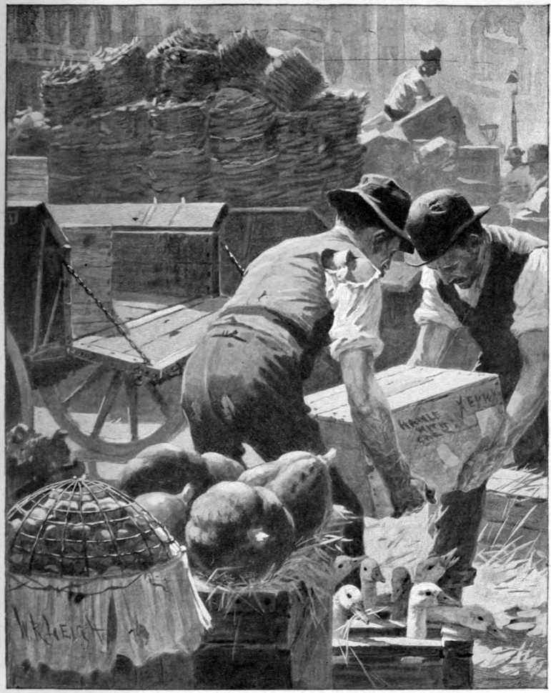 Two men hauling a crate.  There is a cart and a tall pile of goods.