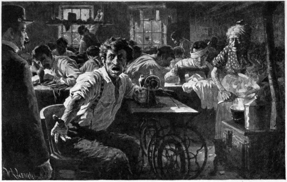 Many people in a room working at sewing machines.
One man in the foreground is talking and appears angry.