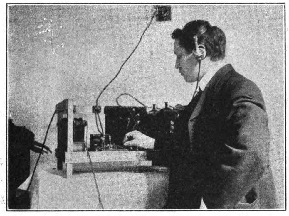 FIG. 111.—Operating the U. S. Signal Corps airship wireless apparatus.