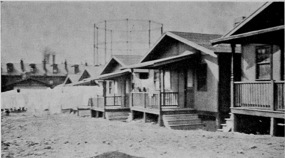 A Row of Model Houses Originally Built by a Steel
Company for its Colored Workers, but used by Foreign Laborers at
Present Because of the Protest of the People in the Neighborhood.